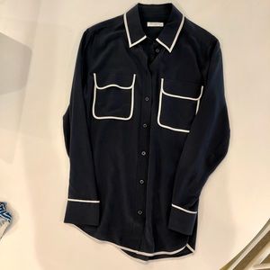 Equipment Navy with white trim button down blouse.